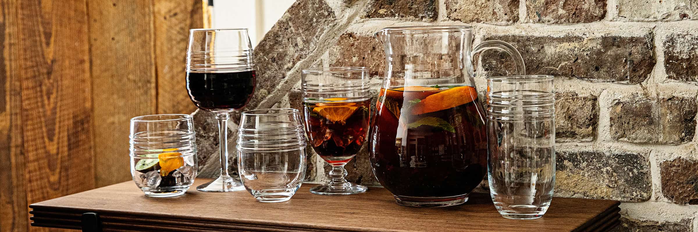 Bilbao Glassware Collection Displayed on a wood table