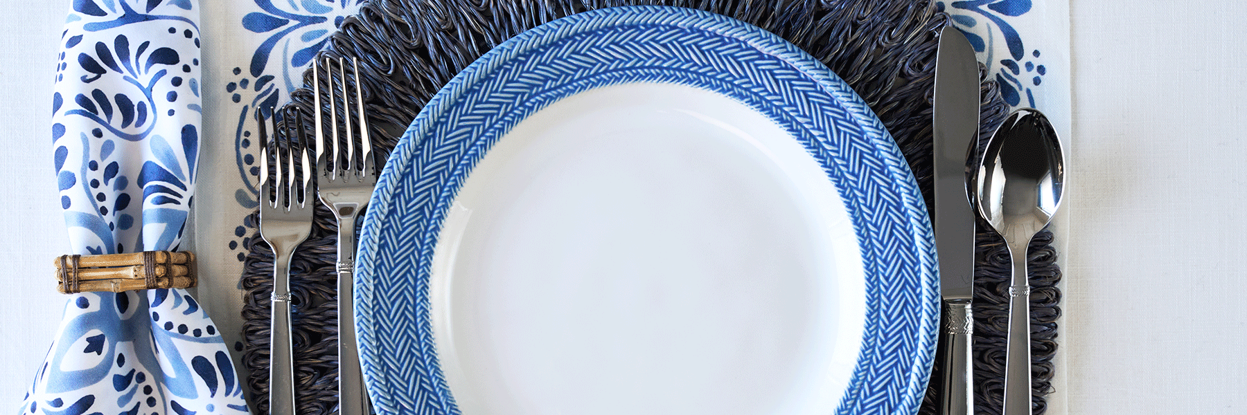Moveable gif featuring a variety of blue dinner and desserts plates from Juliska
