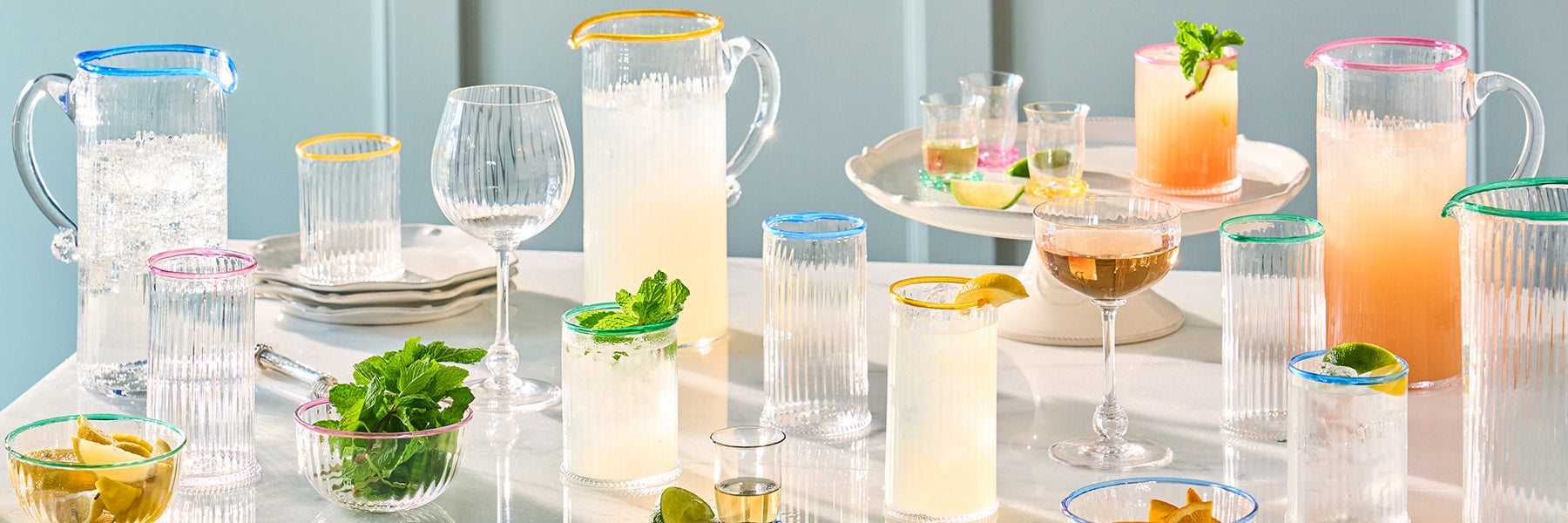 Mix of Nell drinkware in blush, daffodil, chambray and watercress colorways