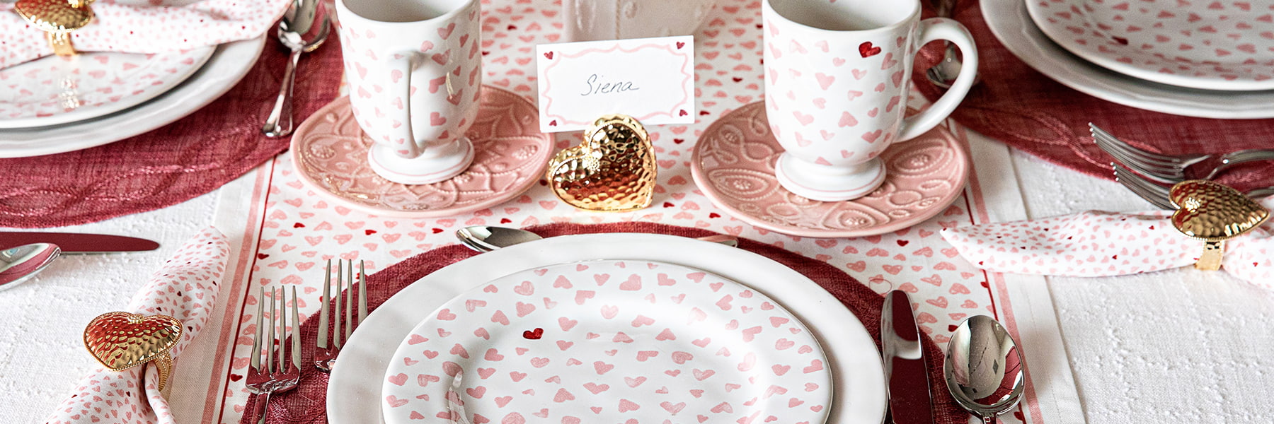 Place setting featuring Love You More collection and L'Amour Toujour pink plates