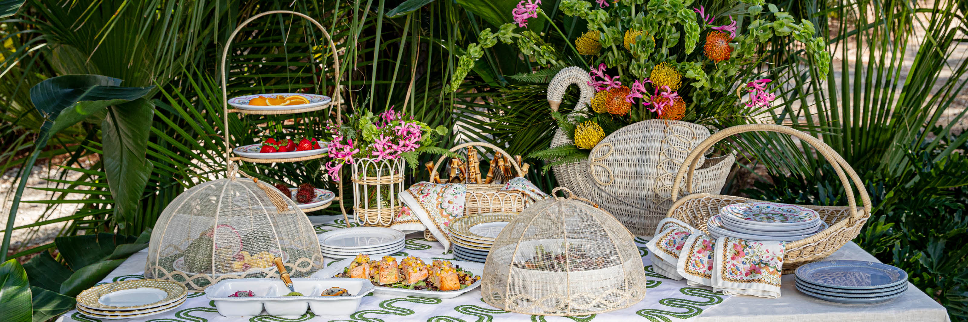 Provence Rattan collection on an outdoor table.