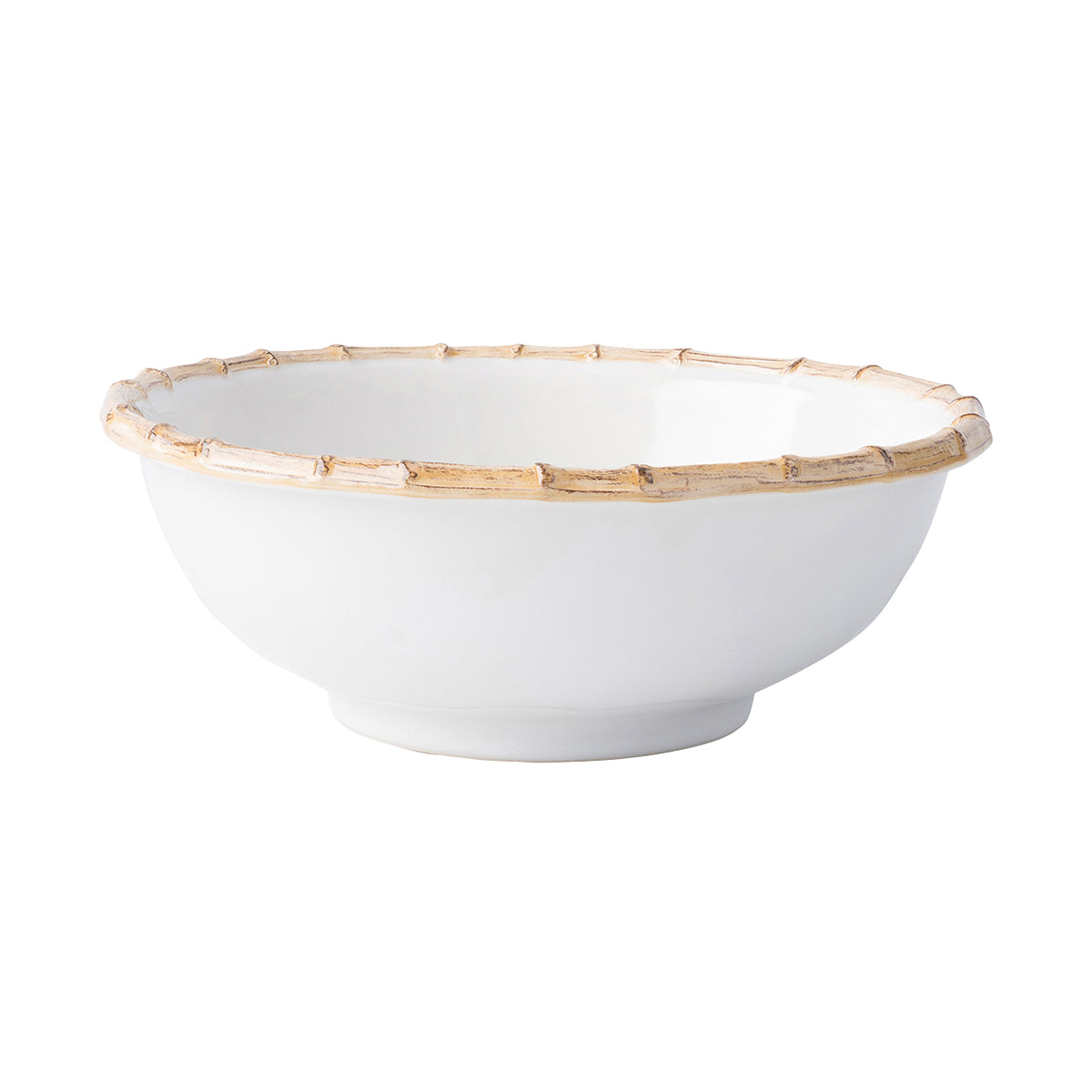 From our Bamboo Collection - A modern serving bowl encircled with a traditional bamboo rim. This piece is a chic addition to any decor.