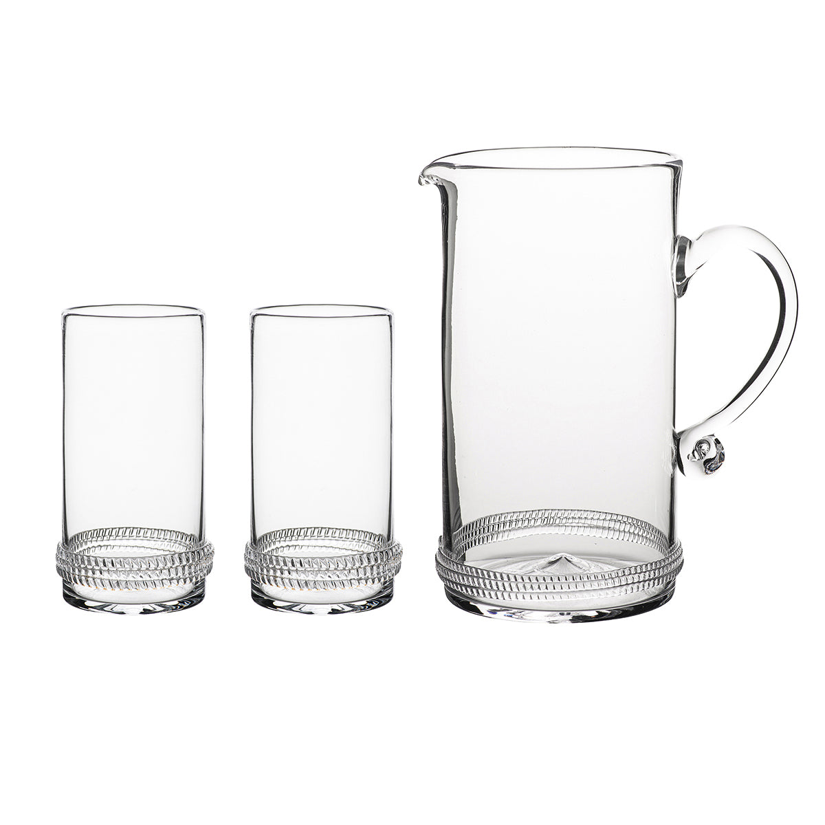 Equal parts streamlined and sturdy, debonaire and distinctive, the Dean pitcher and pair of highball glasses is the quintessential wind down after a long day on the range or on the road. Subtle glass rope detailing encircles the base to capture the perfect amount of sparkle to make an occasion of every day, alongside bourbon and soda, sweet tea, and clinking ice. Handsomely packaged in our signature Juliska gift box.