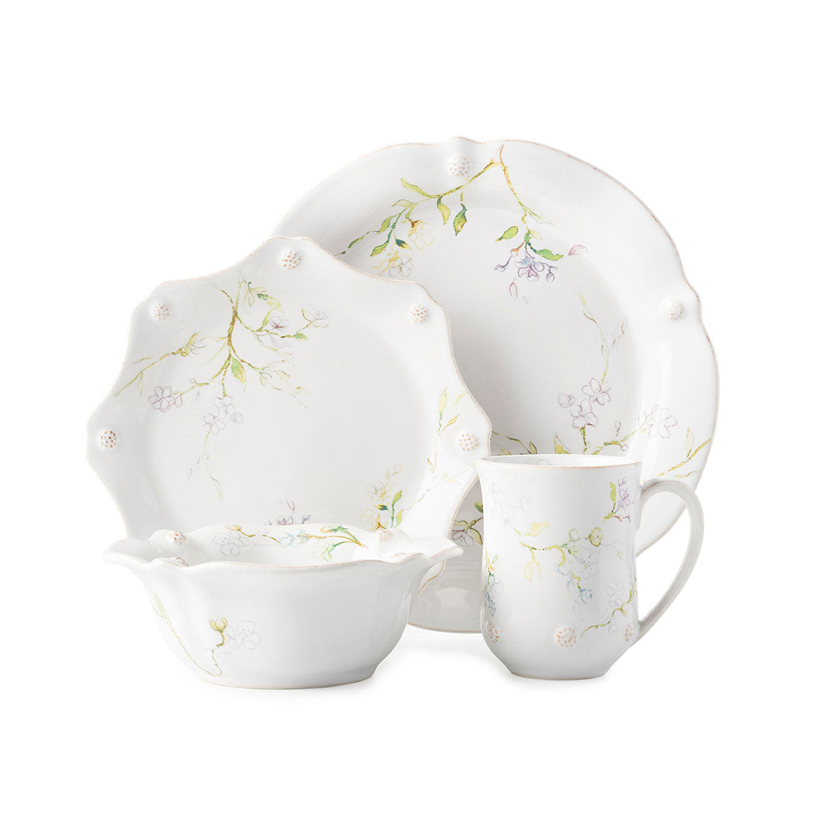 This dinnerware set in whitewash with Jasmine florals, includes a dinner plate, dessert plate, cereal bowl and mug.