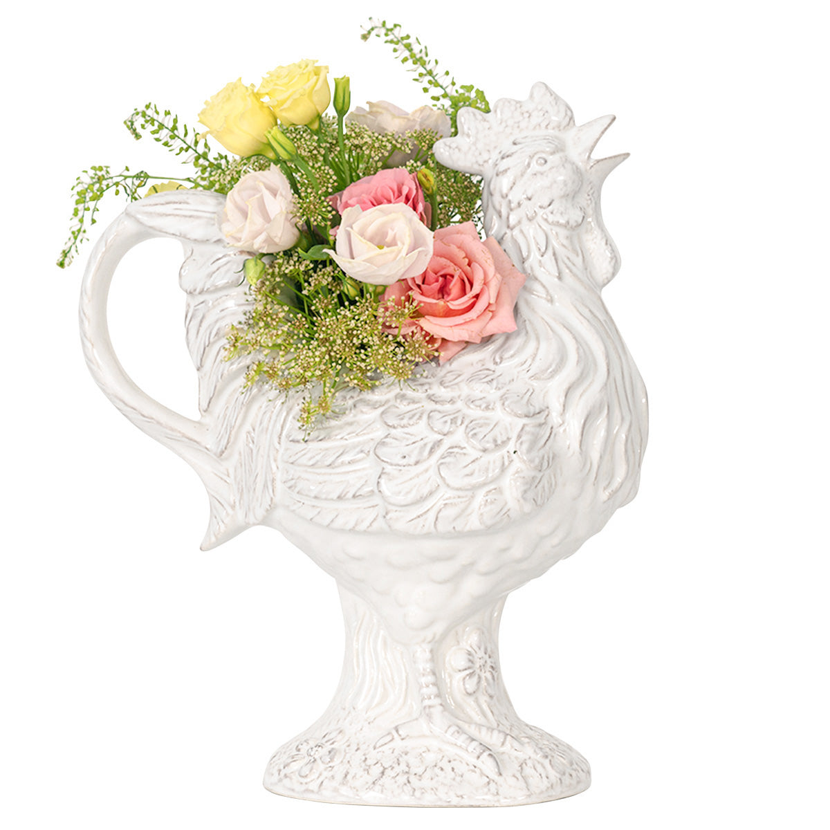 From our Clever Creatures collection - Inspired by the French countryside, this handsome hand-carved rooster was designed to bring whimsy to your everyday. Equally decorative and functional, this robust fellow is a sculptural serving piece that greets every sunrise full of potential, whether filled with a bright bouquet of flowers or a party cocktail for Sunday brunch.Â