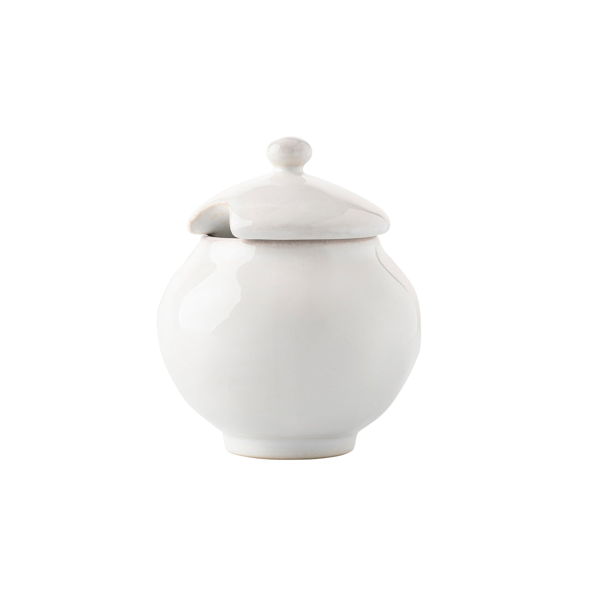 Soundly and roundly elegant, this lustrous little bowl comes with a lid and a notch for a spoon - and makes a sophisticated set alongside our Puro creamer.