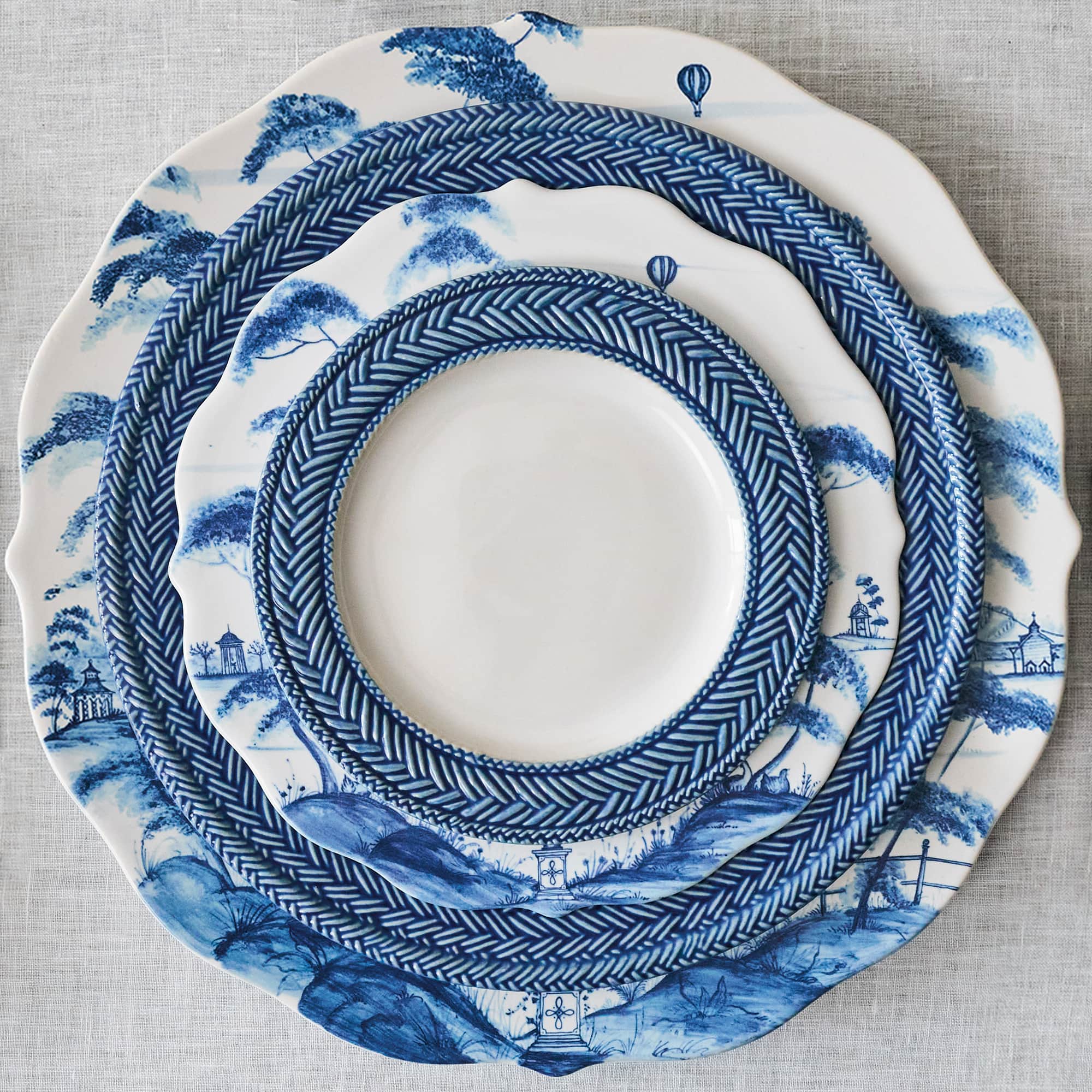 Image featuring mix and match of country estate delft blue plates and le panier delft blue plates.