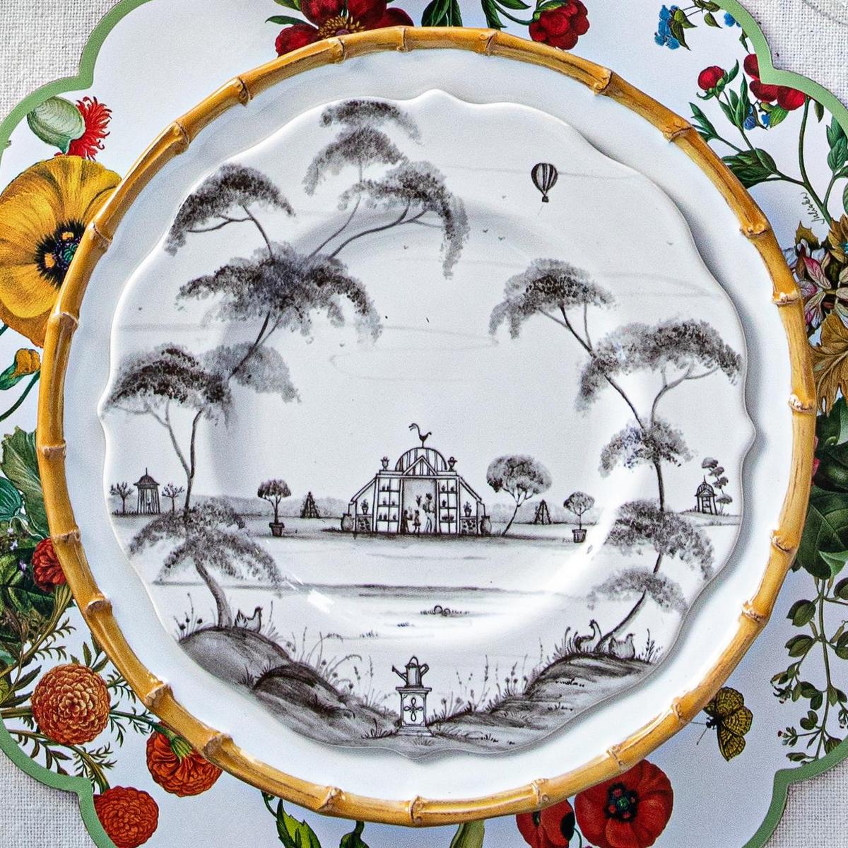 A Country Estate Flint salad plate sits on top of a Bamboo dinner plate.