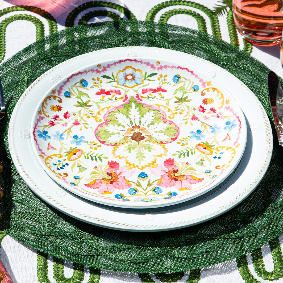 A colorful melamine plate in a unique pattern.