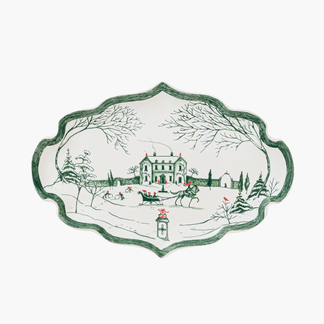 Decorative plate with a winter scene featuring a house, trees, and sleighs on a white background.