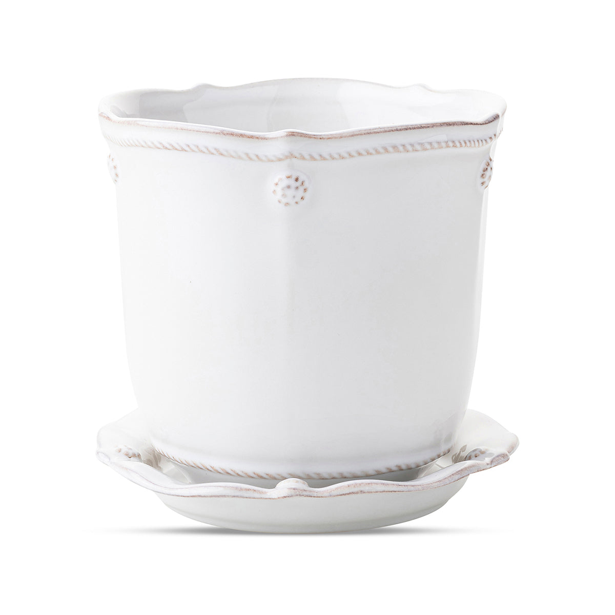 Beautifully display your plants in our new Berry & Thread ceramic planters. Designed with function in mind, they have a small hole at the bottom for drainage and come with a corresponding saucer. This versatile 5.25" size is lovely for a small rose bush, fern, orchid or topiary on a side table, desk, near a kitchen sink or on a bedside table.