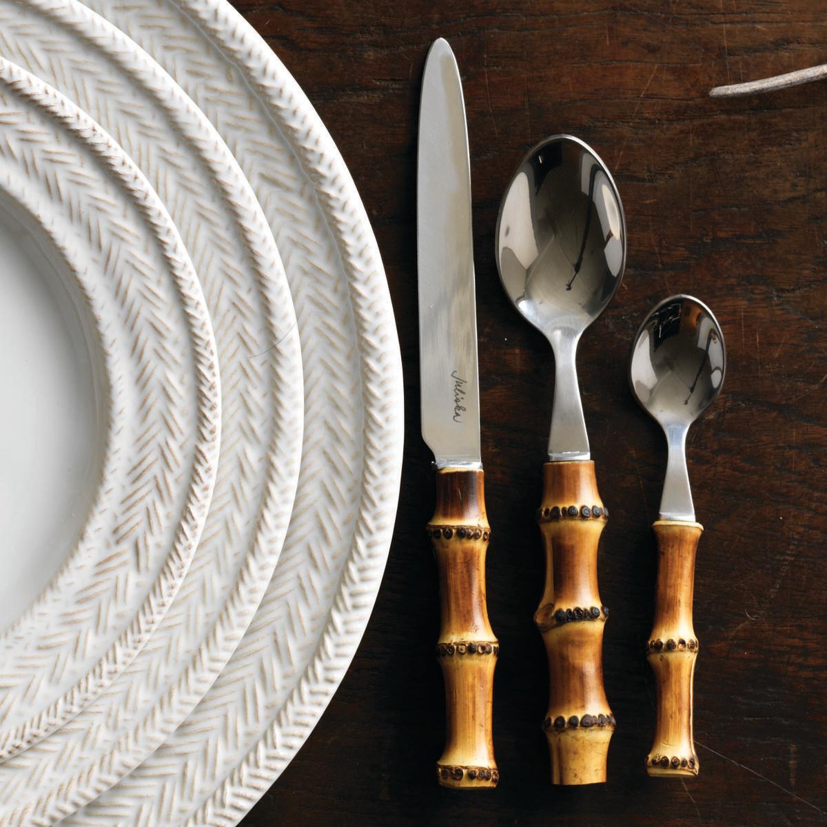 Bamboo Flatware next to Le Panier Dinnerware.
