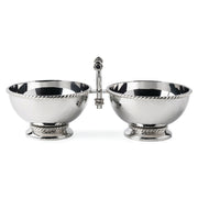 Decorated with a tidy trimming of simple thread, each piece in our Graham barware collection is handmade in hammered stainless steel and polished to brilliance. This two section server features double cocktail-sized bowls and a sturdy handle for transporting your favorite nibbles.