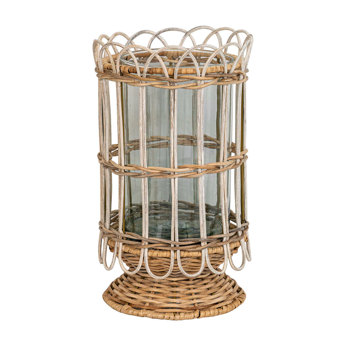 Aglow with flickering candlelight or filled with flowers as a vase, this intricately hand-woven rattan hurricane is rustic, refined, and romantic. Lovely for illuminating cozy corners, hidden terraces, and twilight garden parties.Â