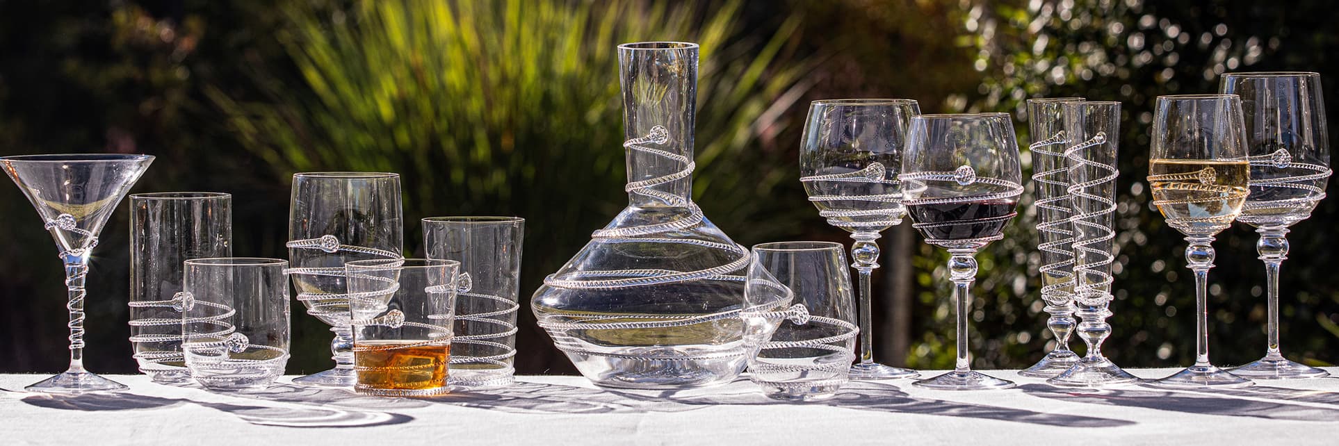 The Amalia Glass Collection Displayed on table outside