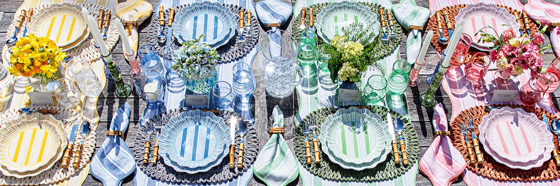Cabana Stripe outdoor collection in Sunshine, Chambray, Seagrass and Coral.