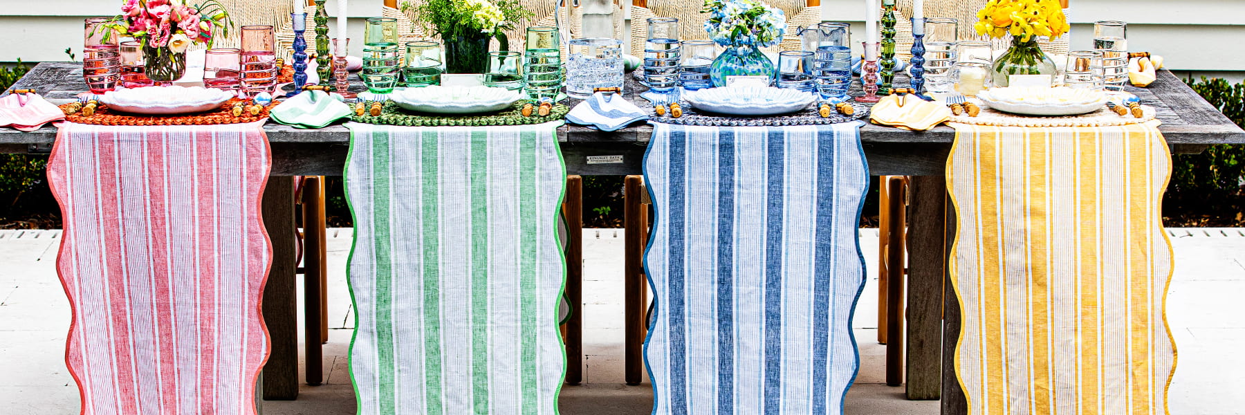 Cabana Stripe outdoor collection in Sunshine, Chambray, Seagrass and Coral.