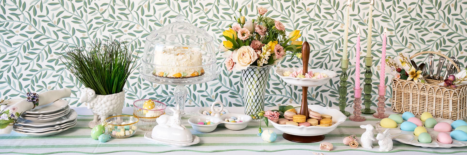 Easter themed table featuring berry & thread whitewash serveware displaying dyed eggs and other pastries 