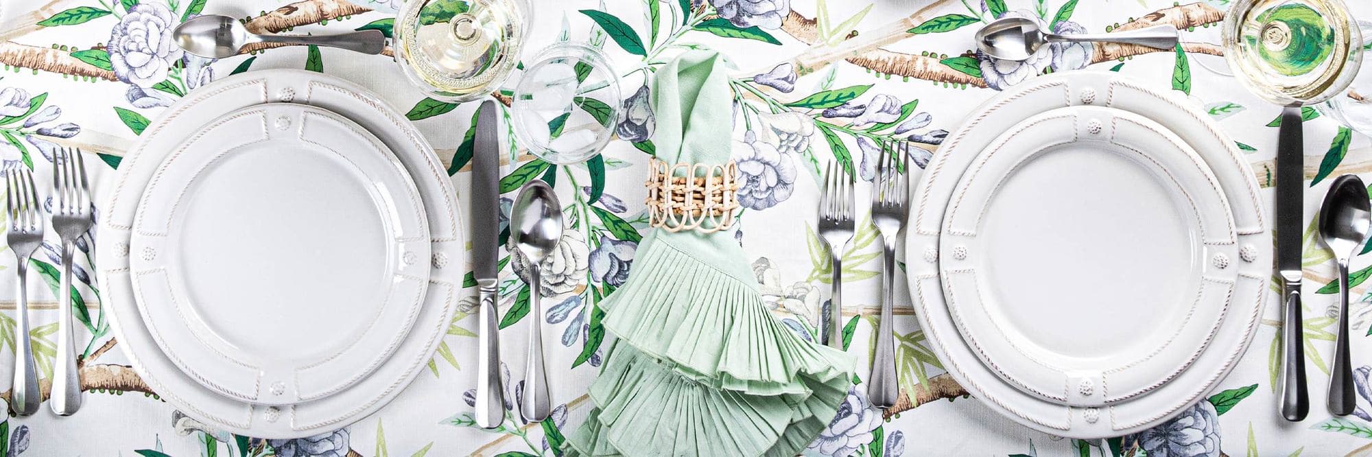 Two place settings of Berry and Thread French Panel.