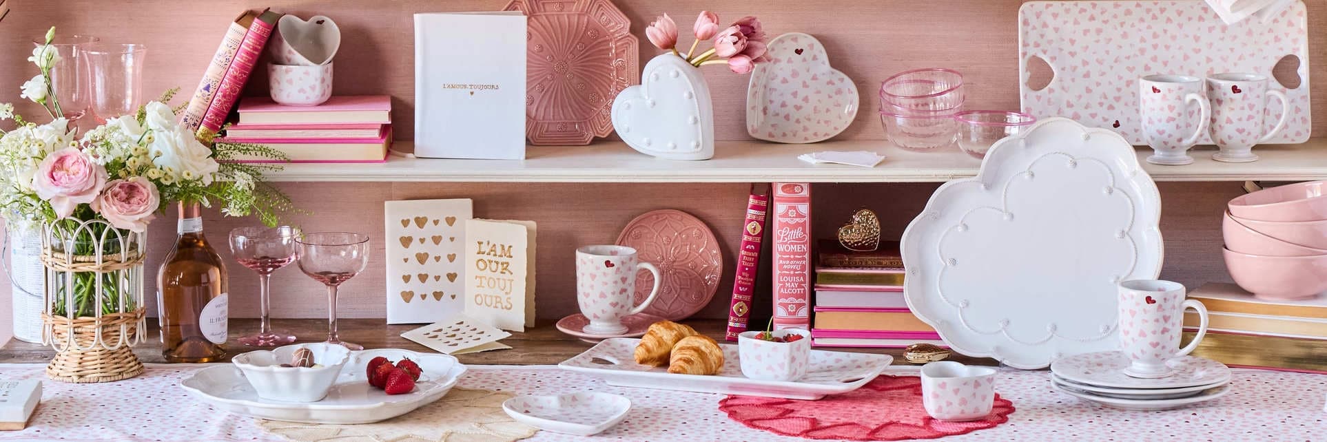 Shelving unit with decorative items including plates, mugs, and books on a wooden surface.