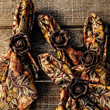 Decorative wreath with floral patterns on a wooden background