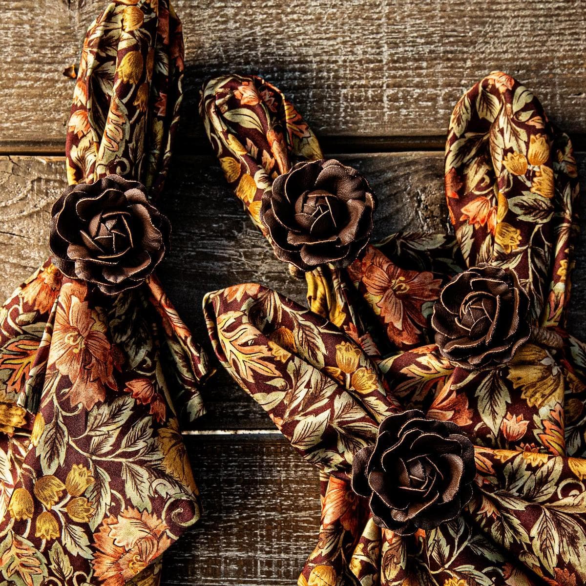 Decorative wreath with floral patterns on a wooden background