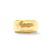 Gold ring with a textured surface on a white background