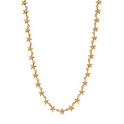 The beauty in this blossoming necklace lies in its simplicity. A delicate chain of refined jasmine flowers is interspersed with tiny white seed pearls to create this simultaneously ornate and understated piece. Fabulous for layering with other necklaces or to shine on its own—because sometimes less is more.