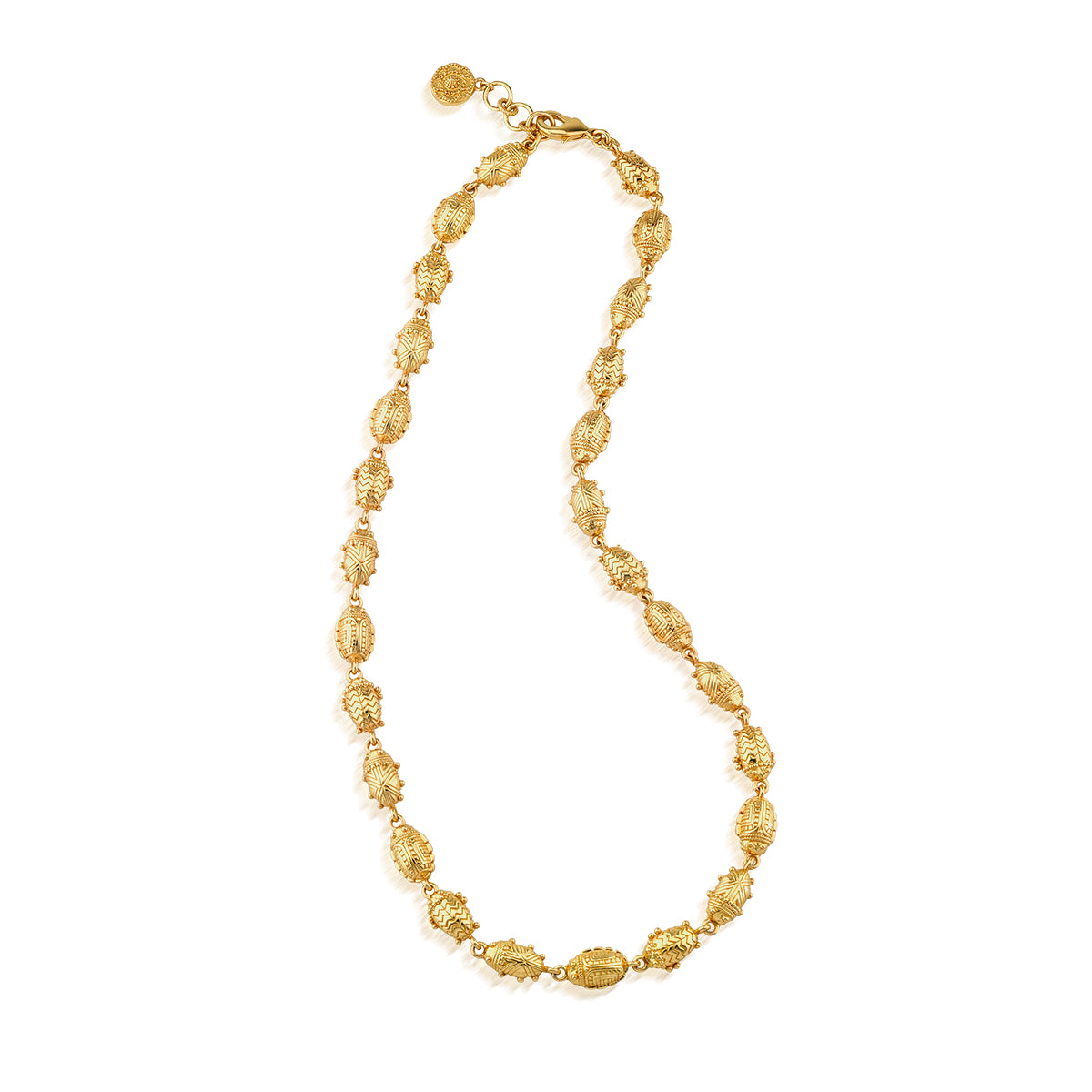 A gold link necklace featuring textured, elongated oval links with a small hanging tag, displayed on a clean white background.