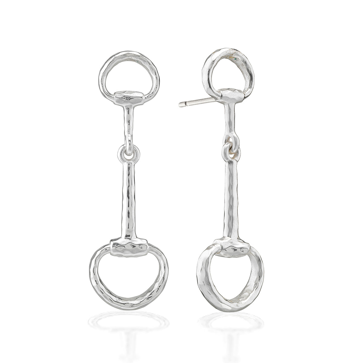 A pair of sterling silver horse bit drop earrings with a hammered finish, shown on a clean white background with subtle reflections below.