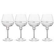 Four fabulous Amalia glasses, festooned with our iconic uplifting swirl and buttoned with a solitary berry upon a statuesque stem, to pair perfectly with hearty reds, vintage treasures, and moments to savor. Packaged in our signature Juliska gift box for an elegant presentation.