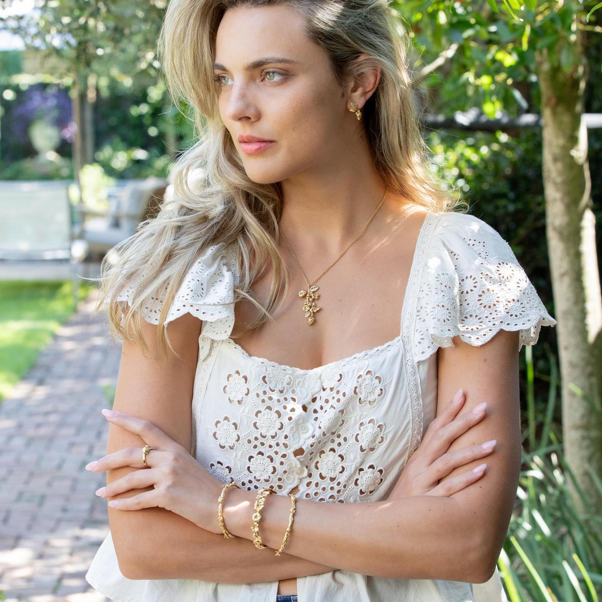 Meadow Walk Bouquet Charm Necklace 16in 2in Gold, lifestyle setting