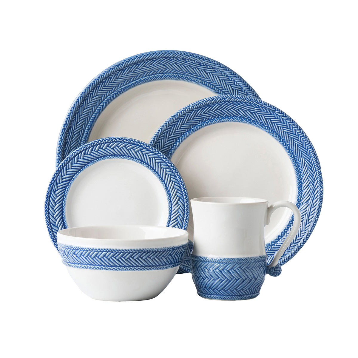 A 5-piece blue and white place setting containing a dinner plate, dessert/salad plate, side/cocktail plate, cereal/ice cream bowl and mug.