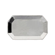 We are enchanted with the distinctive dimpling effect that is polished to brilliance for an undeniably sophisticated effect --use this versatile tray for carrying cocktails al fresco, as a mainstay at the bar, and even serving tea in the garden. Decorated with a tidy trimming of simple thread, each piece in our gleaming Graham barware collection is handmade in hammered stainless steel.