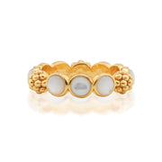 Adorned with lustrous drops of mother of pearl and a sprinkling of golden berries for a look that is polished and feminine, this ring adds a fabulously feminine flourish to any ensemble—whether you’re running a meeting, hosting a dinner party or jet-setting to Monaco. Equally sweet and sophisticated, it’s equally lovely on its own or in a stack.