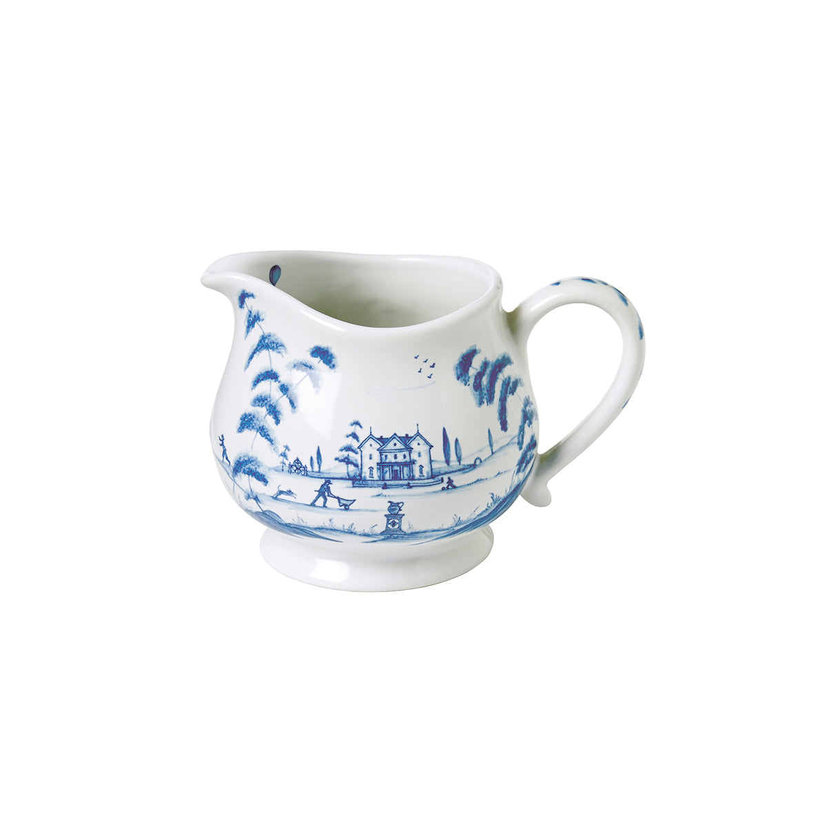From our Country Estate Collection - The British art of taking tea in stately historic homes is easily evoked with this gorgeous little creamer that is illustrated with our graceful Country Estate Main House on one side, and a charming dairy barn on the other. Tealicious Tip: Etiquette dictates one should add cream to the teacup after the tea is poured, not before.