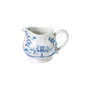 From our Country Estate Collection - The British art of taking tea in stately historic homes is easily evoked with this gorgeous little creamer that is illustrated with our graceful Country Estate Main House on one side, and a charming dairy barn on the other. Tealicious Tip: Etiquette dictates one should add cream to the teacup after the tea is poured, not before.