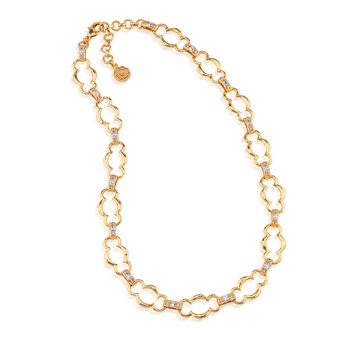 A gold-tone chain necklace featuring alternating openwork oval links and smaller links set with clear stones, displayed on a clean white background.