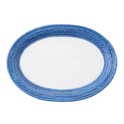 The large scale of this basket-weave motif instantly evokes the bounty of the earth and echoes of its harvest. Richly textural and classic in our whitewash glaze, this platter serves up your superstar dishes for a crowd with elegant ease