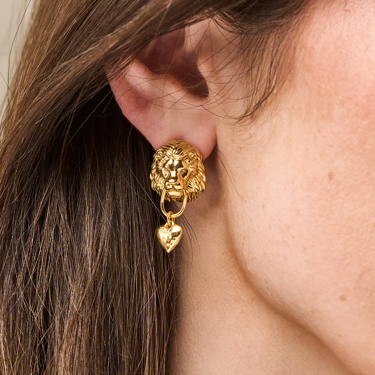 Lionheart Post Earrings - Gold close up on model