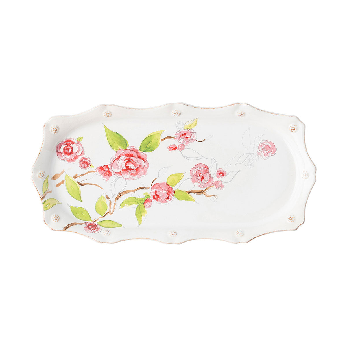 Scalloped whitewash tray with a colored sketch of camellias on it.