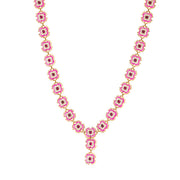 A garland of petite dianthus blossoms in petal pinks, white, and bright golden flourishes brings a dose of feminine flower power to complement any outfit or occasion. Meaning “divine flower,” these beguiling blooms are crafted of vibrantly hand-painted enamel with luminous fuchsia jade gemstone centers for a look that’s dainty yet decadent, subtle yet striking. This convertible necklace can be worn with or without the center drop, so that you can adjust it to suit your neckline.