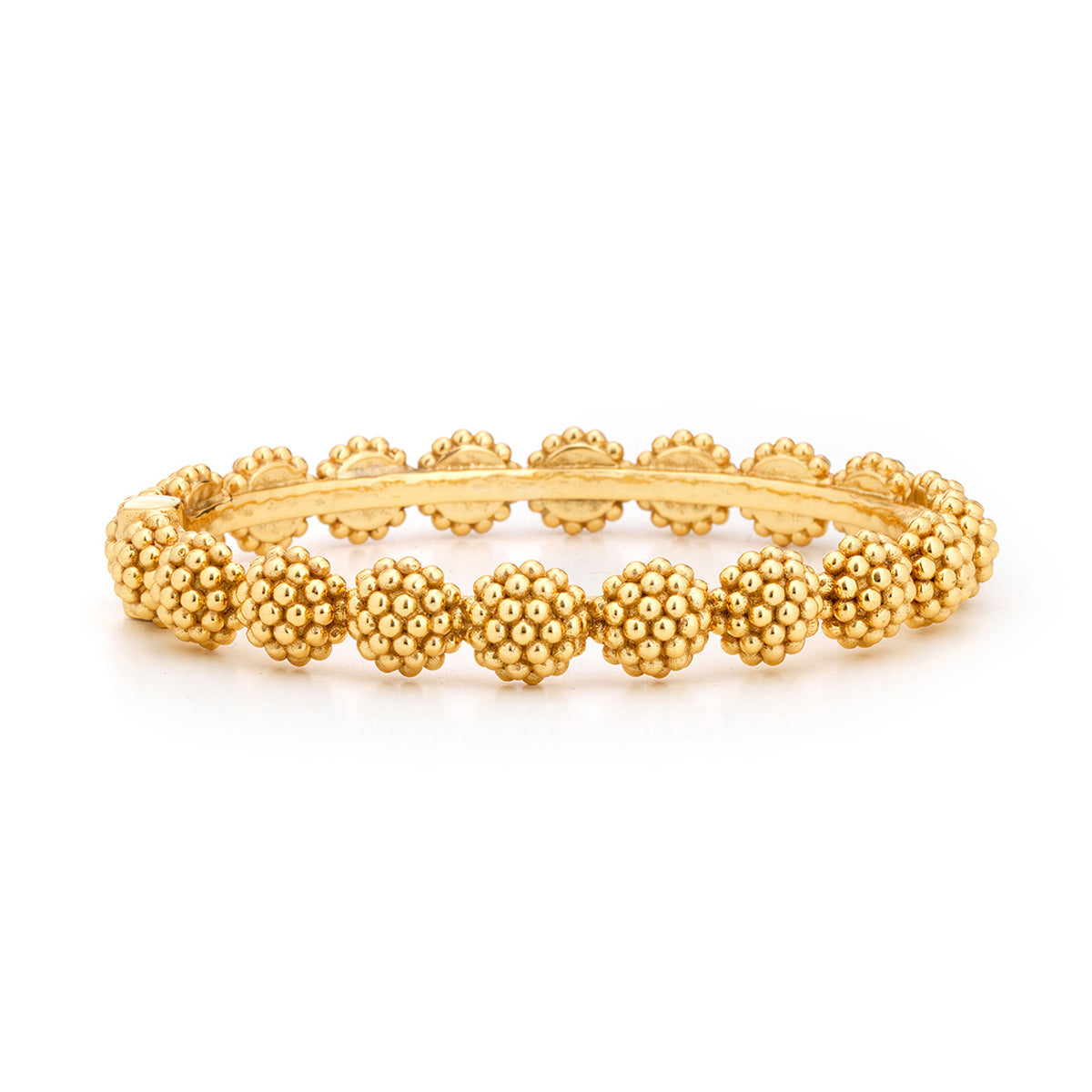 Gold beaded bracelet on a white background
