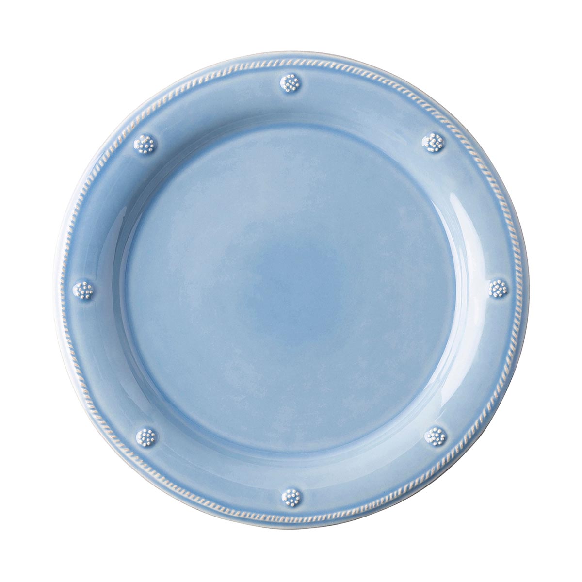 Rimmed with a simple thread and adorned with a sprinkling of berries, this iconic dinnerware collection embraces historic motifs in a sublime blue hue. This casually elegant dinner plate is divinely versatile and infuses your table with everyday sophistication.