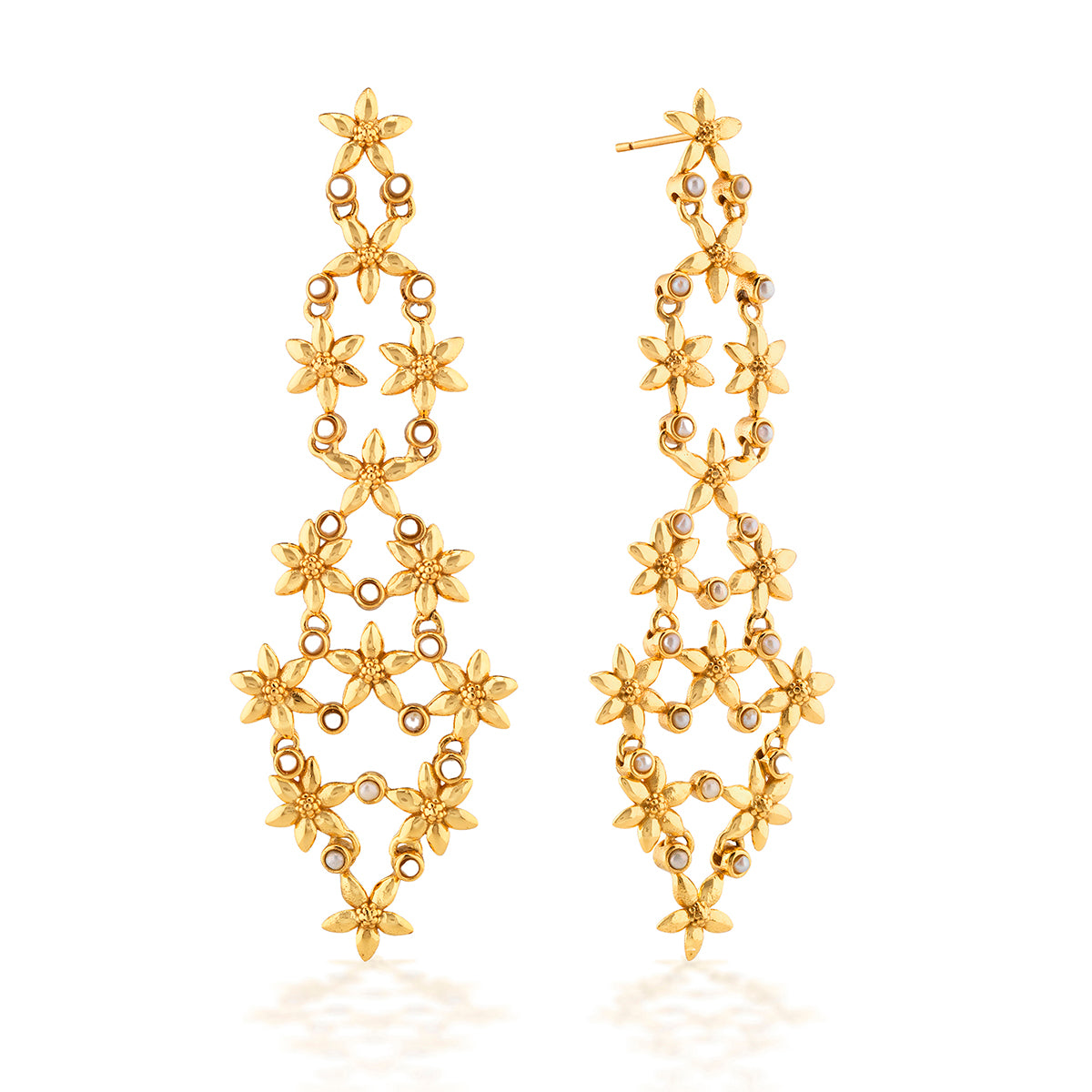 Chandelier earrings fit for the palace of Versailles, this elegant pair is as dainty as gilded lacework, yet fabulously feminine and striking. Composed of intricate jasmine blossoms and a sprinkling of ethereal pearls—wear these for romantic affairs or anytime you wish to feel like a princess.