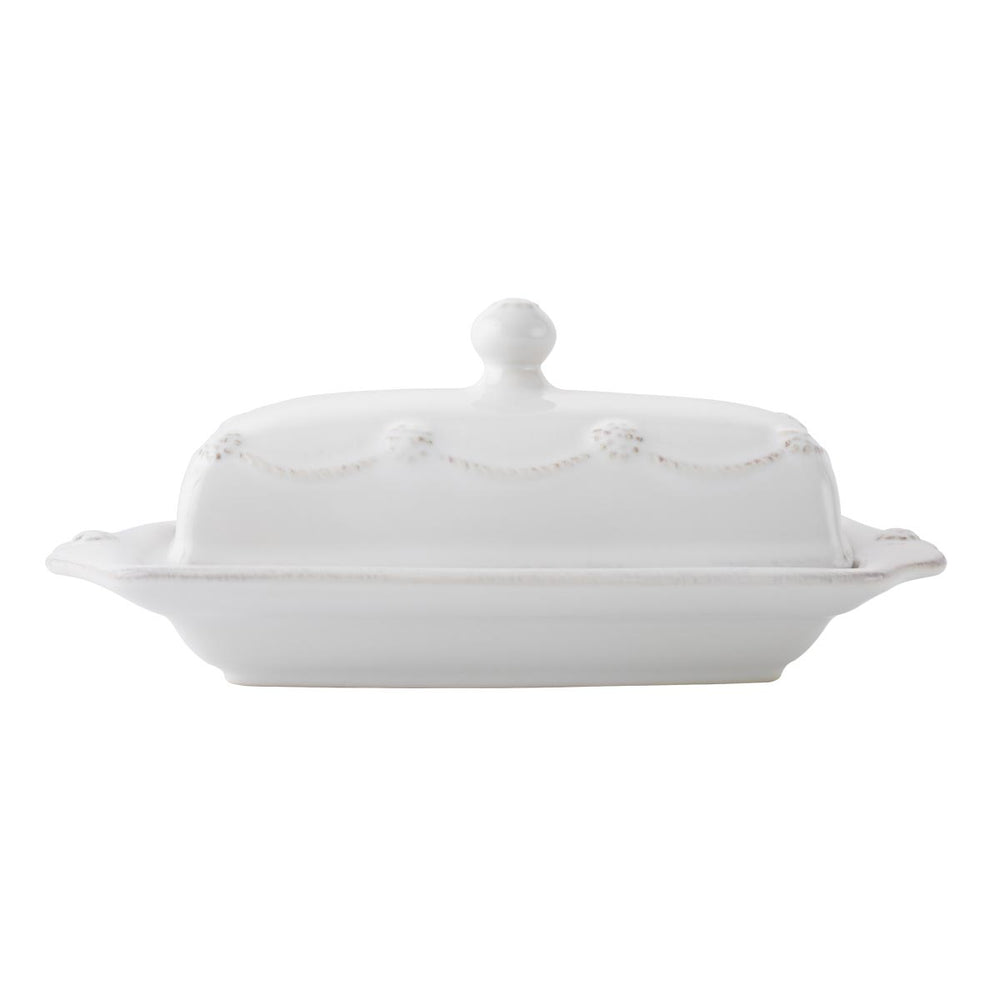 Butter never looked better than when ensconced within this charming dish - scalloped handles make passing it around the table a breeze, and a lid accented with a garland of thread and berries lends just the right touch of refinement.