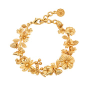 A garland of wildflowers, blooms and butterflies compose this intricately detailed golden bracelet that brings a sense of romance and whimsy to your everyday adventures and special occasions alike. Fabulous on its own or to enliven any bracelet stack, this blossoming bangle is the perfect finishing touch from Mother Nature to elevate any outfit.