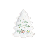 On a gleaming and snowy whitewash background and trimmed with a sprinkling of our iconic berries, this petite tree platter is decorated with our magical winter wonderland scene from the North Pole. Perfect for presenting appetizers and sides, and positively irresistible with homemade sugar cookies!