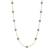 This dainty, double-sided station chain necklace is a vision in bright, gleaming gold and turquoise blue, interspersed with our clever double-sided clovers that playfully flip throughout the day—from turquoise clovers with golden berry centers to golden clovers with turquoise centers.