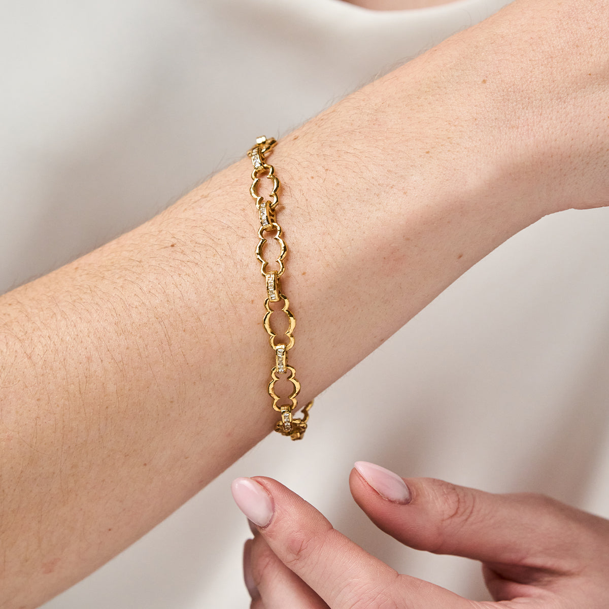 Maharani Petite Chain Bracelet, 7"+2" - Clear Cubic Zirconia close up on model 